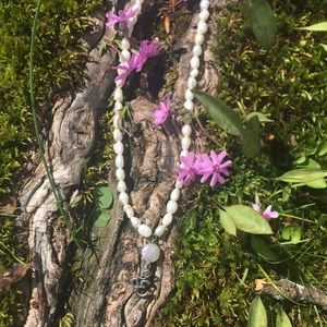 Silver Hamsa, with freshwater pearls.